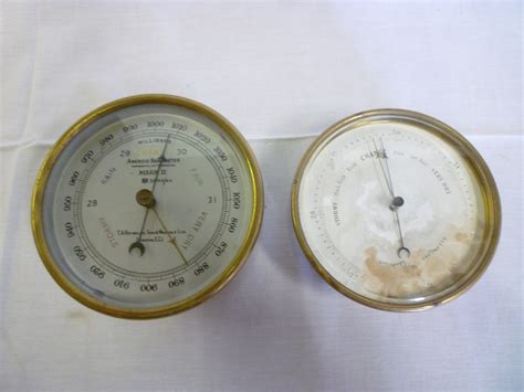 A Small Aneroid Barometer By T A Reynolds And Son London With Silvered