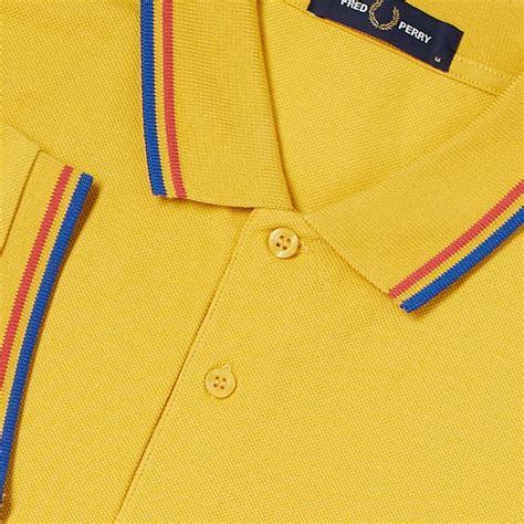 Fred Perry Slim Fit Twin Tipped Polo Yellow Red And Blue End Us