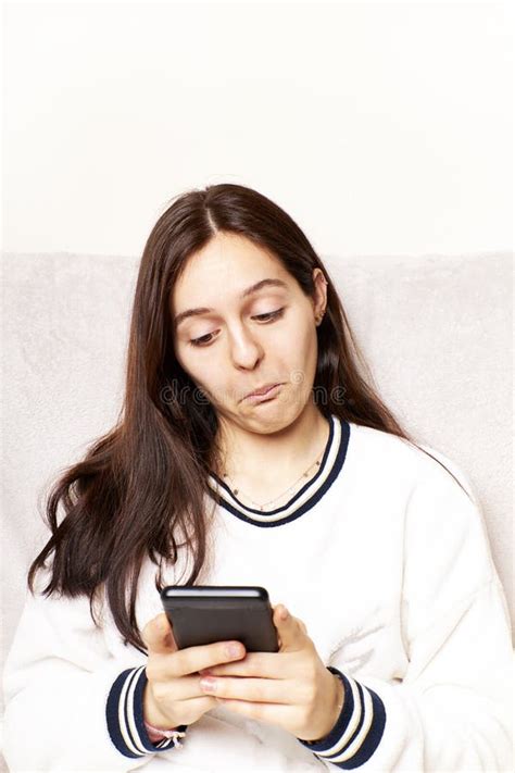 Happy Millennial Generation Hispanic Latina Woman Looking At Cell Phone Screen Feeling Excited