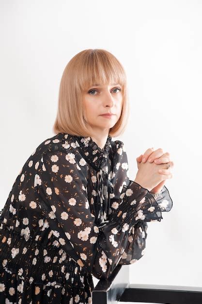 Premium Photo Portrait Of Blonde Woman 35 Years Old In Dress Indoor