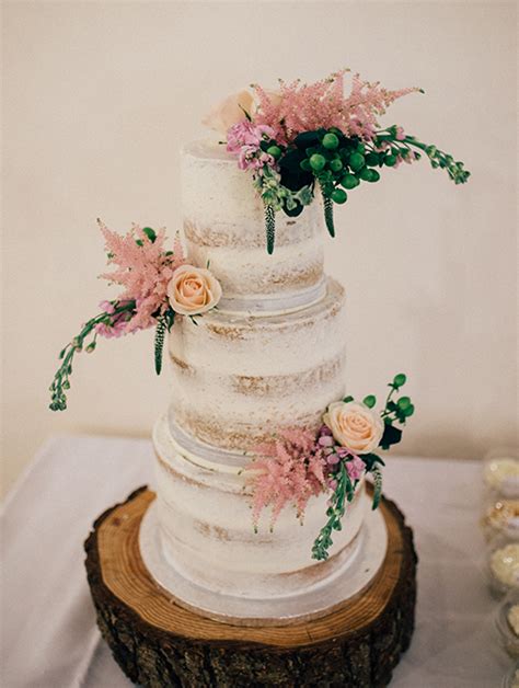 The Couple Chose A Naked Wedding Cake With Spring Florals To Match