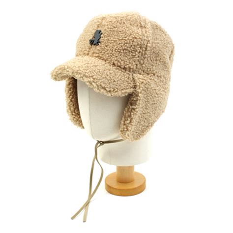 MUSINSA UNIVERSAL CHEMISTRY Thunder Beige Fleece Earflap Cap