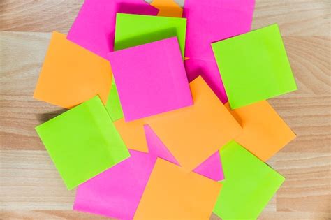 Premium Photo Sticky Notes In Different Colors On Floor