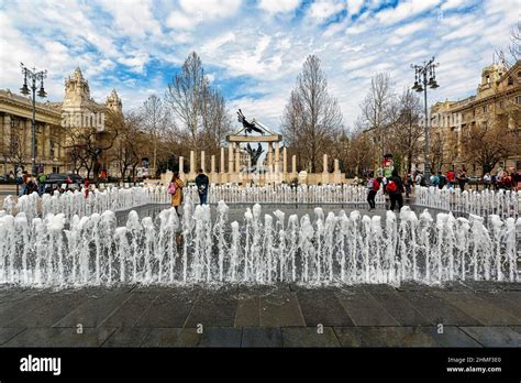 Visitors at the fountain in front of controversial monument to the victims of the German ...