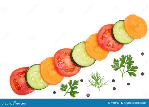 Tomato Cucumber And Carrot Slice With Spices Isolated On White