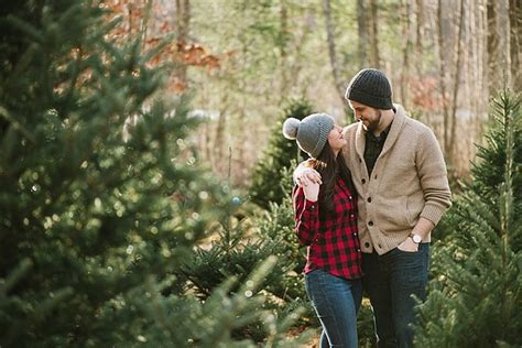 Tara And Calvins Romantic Christmas Tree Farm Engagement Photos