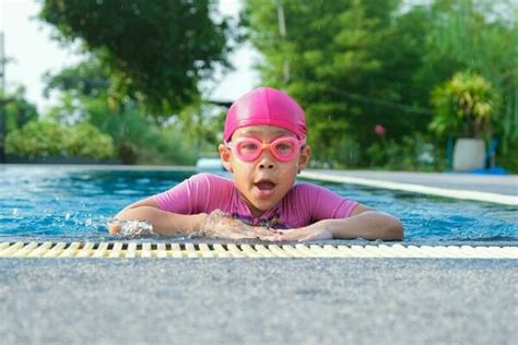 Little Girl Swim Stock Photos, Images and Backgrounds for Free Download