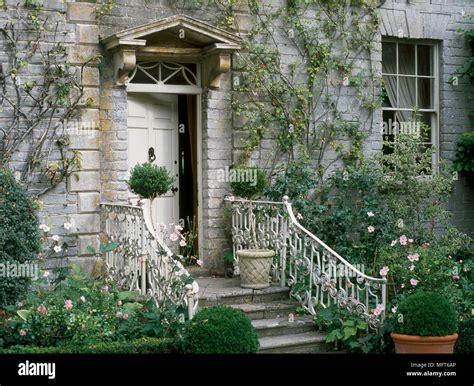 A detail of an exterior of a Georgian stone country house showing the ...