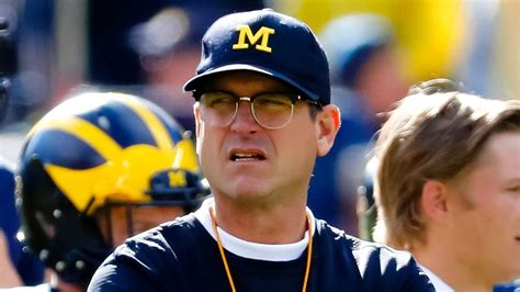 Jim Harbaugh and his coaching staff dress up for Halloween, trick-or ...