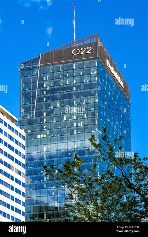 Warsaw, Poland - May 22, 2020: Top of Q22 office tower at John Paul II avenue and Grzybowska ...