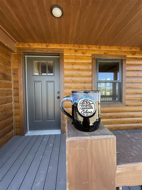 Log Siding Maintenance - Riverside Cabins