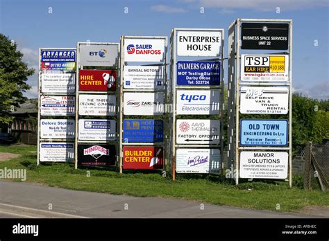 Clutter Of Signs Outside An Industrial Estate In Swindon Stock Photo