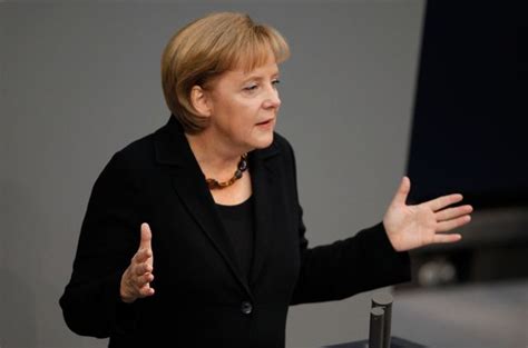 Merkel Addresses Parliament Economic Crisis Is Germany S Biggest