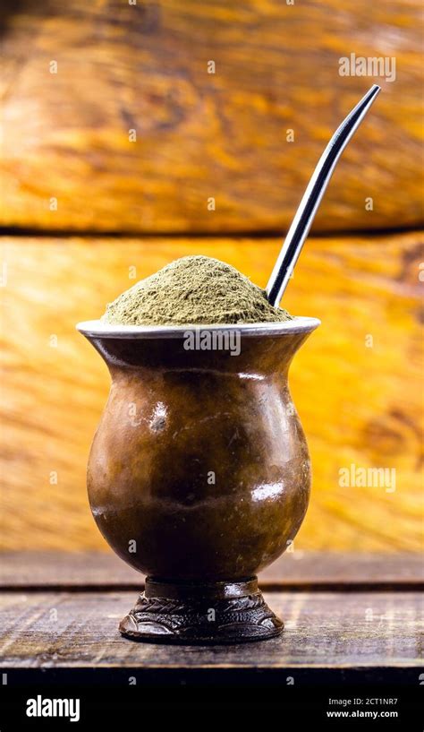 Yerba Mate Tea In Wooden Bowl On Wooden Table Traditional Drink From