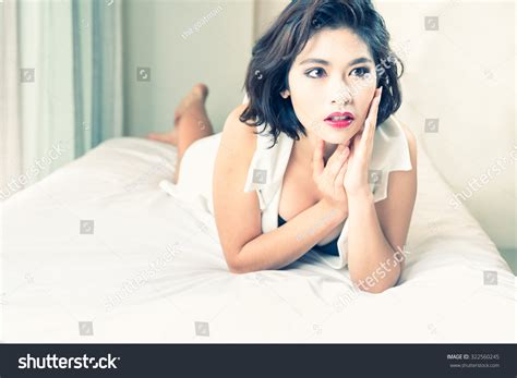 Sexy Asian Woman Black Bikini Lying Stock Photo 322560245 Shutterstock