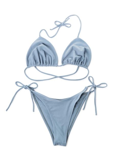 Elegante Bikini Azul En La Vista Superior De Fondo Blanco Foto Premium