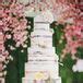 Naked Tiered Cake With Flowers