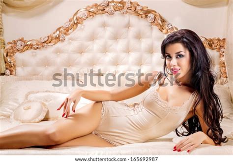 Photo Sexy Brunette Woman Lying Big Stock Photo 165692987 Shutterstock