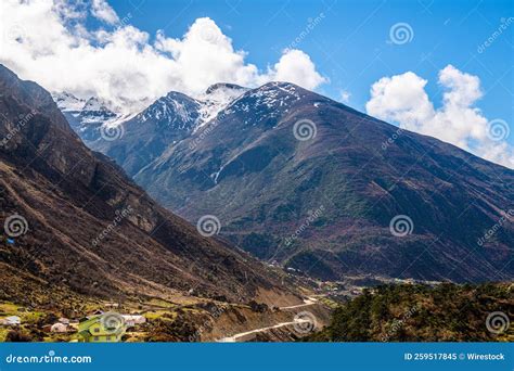 Low Angle Of Landscape In Chopta Valley With Yellowing Mountains