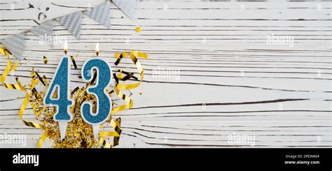 Number 43 Blue Celebration Candle On White Wooden Background Happy