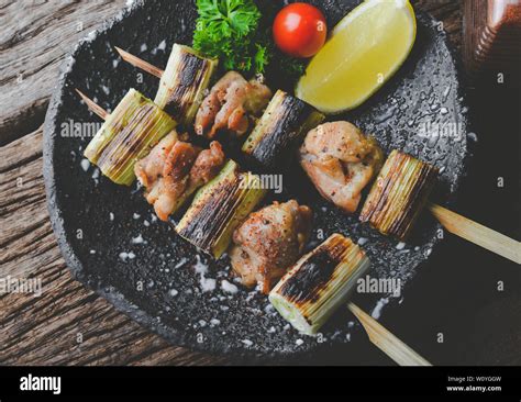 Japanese Style Skewers Chicken Meat Grilled Or Yakitori Izakaya Food Serve In Plate With Grey