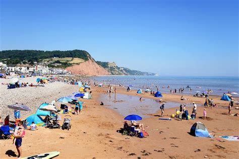 Tourists on Sidmouth Beach, UK. Editorial Stock Photo - Image of pebble ...