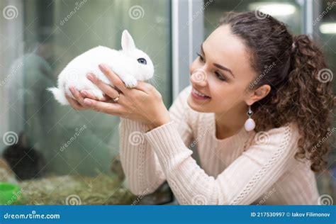 Portrait Of Young Happy Woman Holding Rabbit Stock Image Image Of