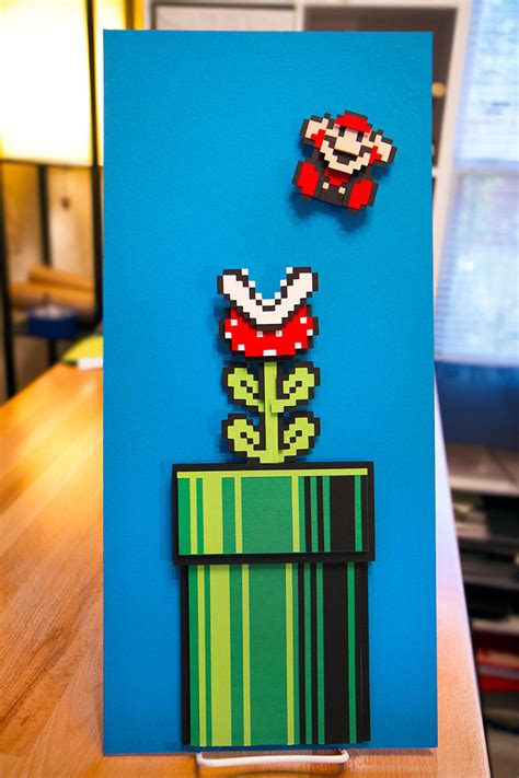 8 bit Piranha Plant and Mario handcut papercraft on Behance