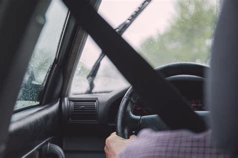 Man Driving On A Rainy Day Freestocks Org Free Stock Photo