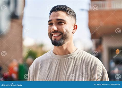 Young Arab Man Smiling Confident Standing At Street Stock Photo Image