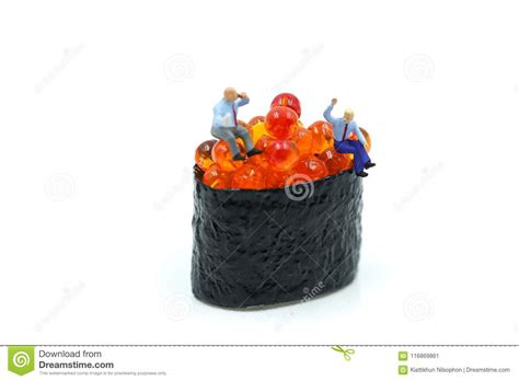 Miniature People Businessman Sitting With Salmon Egg On Sushi Stock