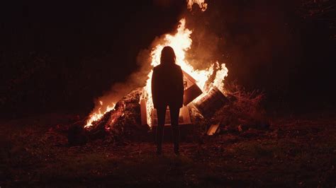 Woman Standing In Front Of Fire FILMPAC