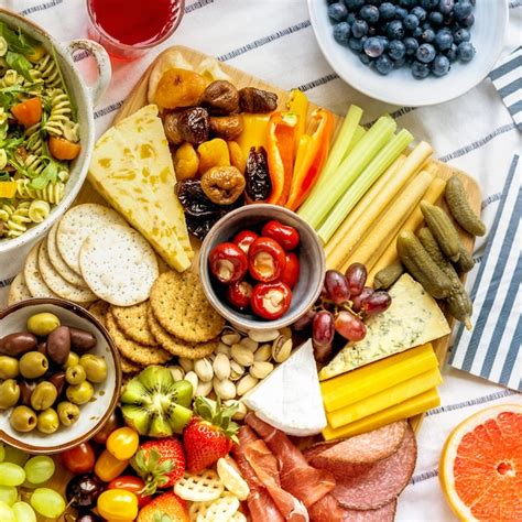 Free Photo Charcuterie Board With Cold Cuts Fresh Fruits And Cheese