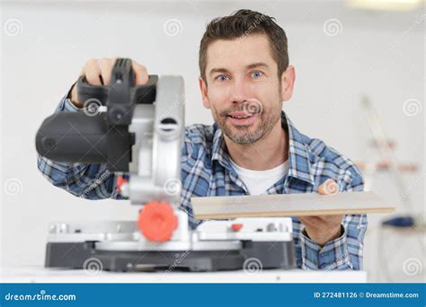 Carpenter Using Circular Saw In Workshop Stock Photo Image Of