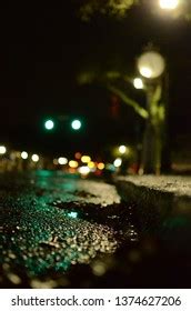 Wet Asphalt Sidewalk Under Streetlights Stock Photo 1364590547