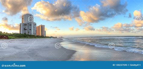 Sunrise Over the White Sand of Vanderbilt Beach in Naples Stock Image ...