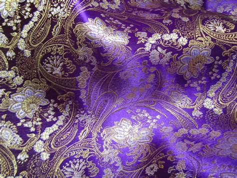 Chinese Brocade Fabric In Royal Purple With A Floral Pattern