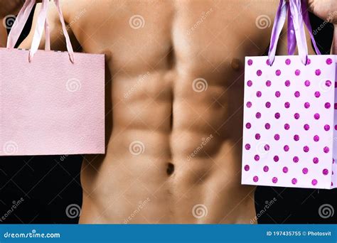 Athletes With A Naked Torso Do Push Ups On The Uneven Bars In The Gym Strong Muscular Man Doing