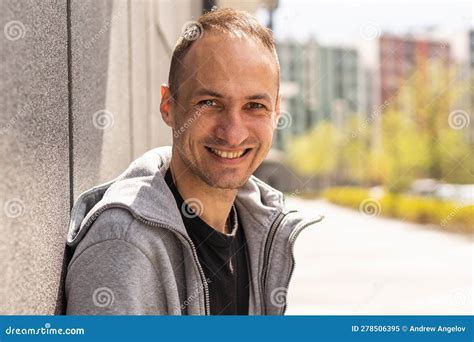 Successful Caucasian Middle Aged Man In Casual Outfit With Arms Crossed