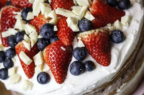 A Detail Of A Home Made Naked Cake With Cream Strawberries Stock Photo