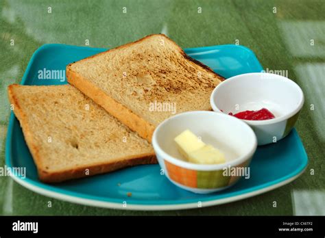 toast with jam and butter spread for breakfast Stock Photo - Alamy