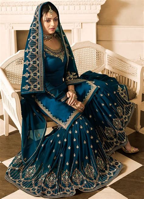 Teal Blue Embroidered Gharara Suit Features A Satin Georgette Kameez