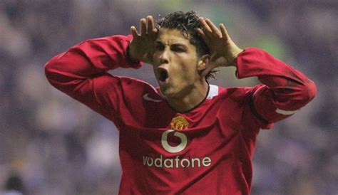 A Soccer Player Holding His Hands To His Head