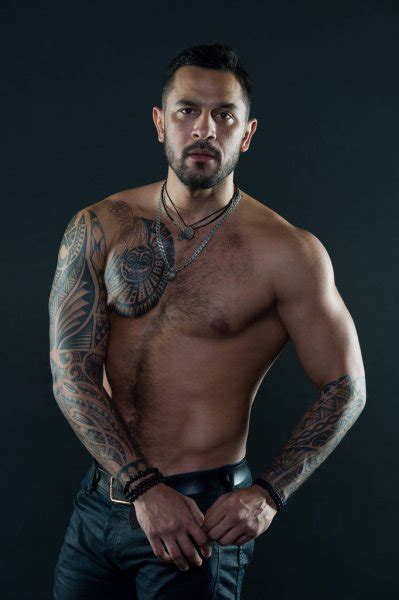 Sport And Fitness Masculinity Muscular Torso Tempting Glance Bearded Man With Tattooed Torso