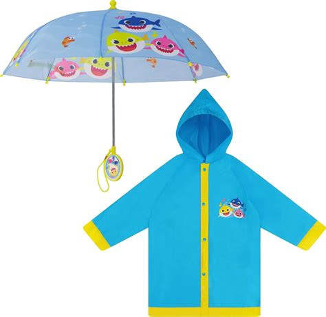 Raincoat In Rain And Umbrella