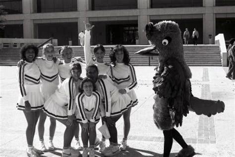 Cheerleaders with UTSA Mascot Rowdy at the Sombrilla Event