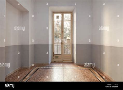 Empty Room Interior With Tiled Floor And Window With Balcony Stock