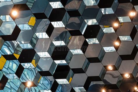 Hexagonal Mirrored Tiles with Lights Creating Dynamic Reflective ...