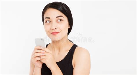 Cute Happy Asian Girl Hold Phone Isolated On White Background Stock