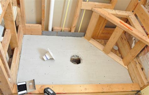 how to install a shower pan on a concrete slab